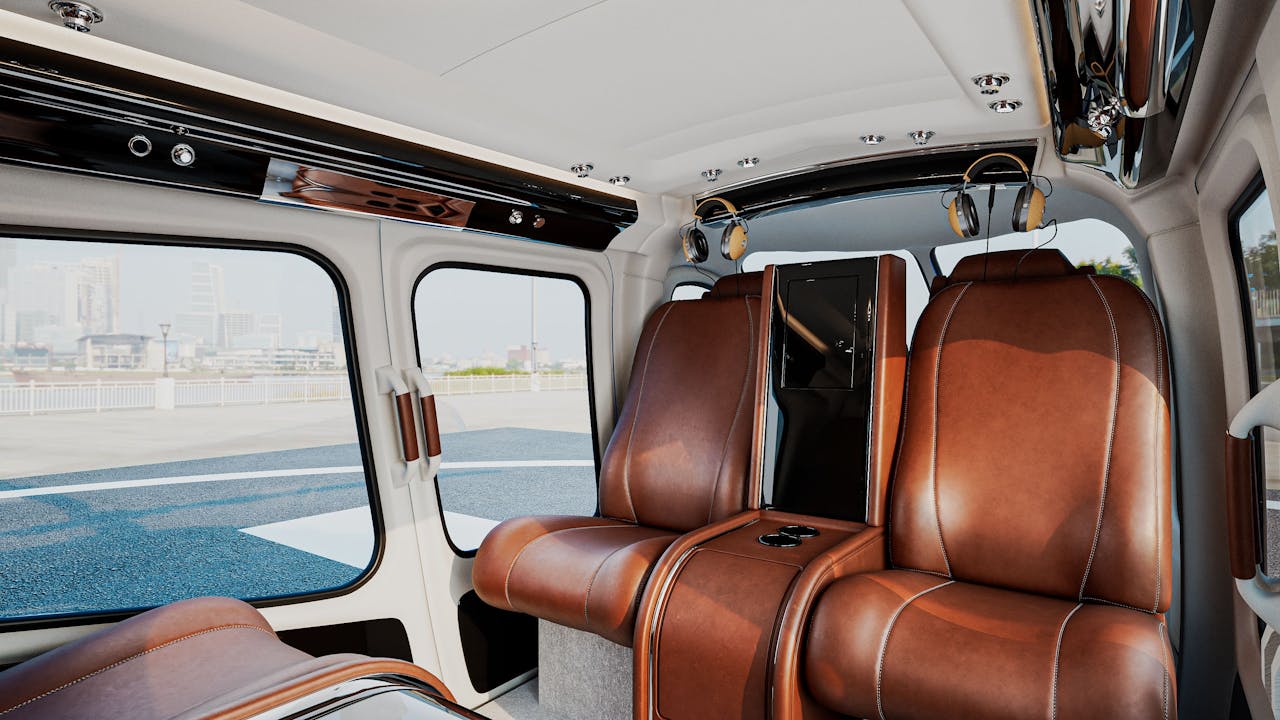 Interior view of a luxurious private helicopter with brown leather seats and a cityscape view.